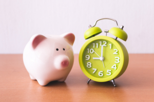 piggie bank and clock